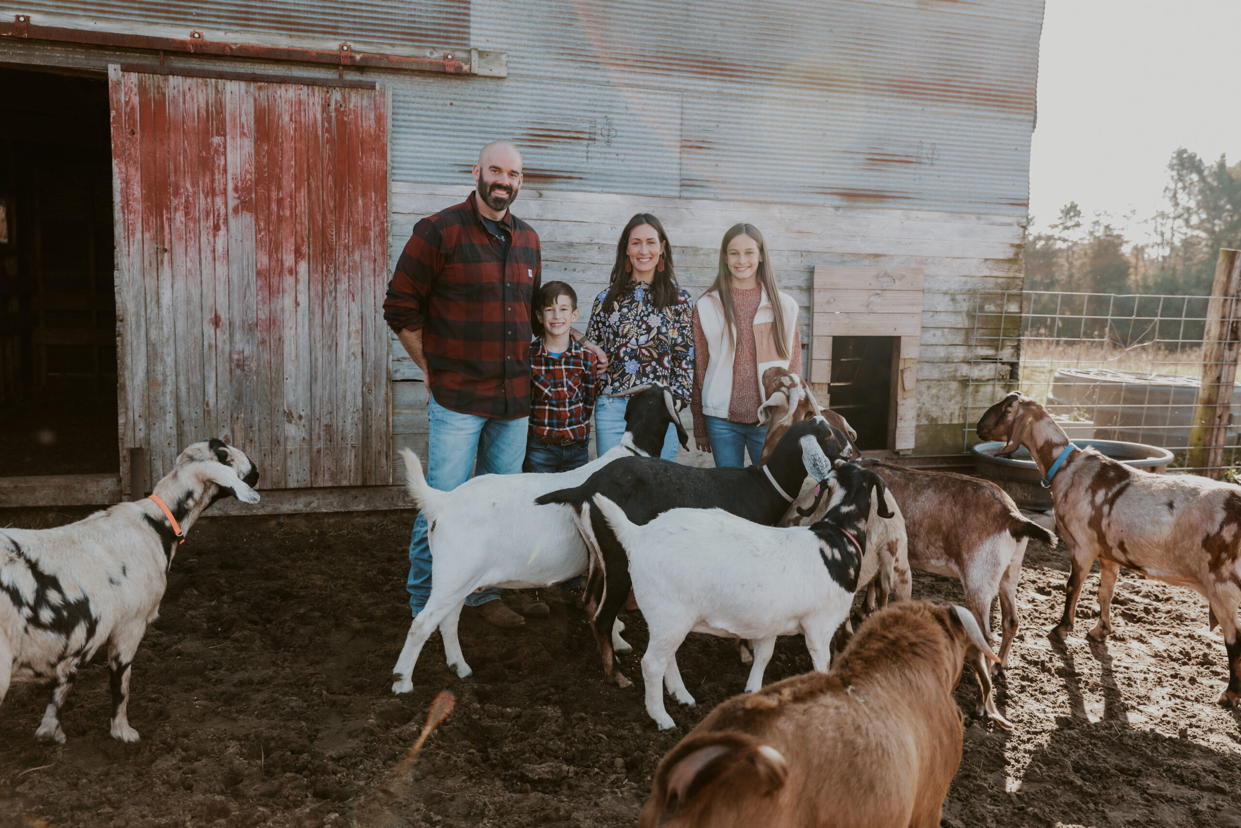 Family raising goats for meat.
