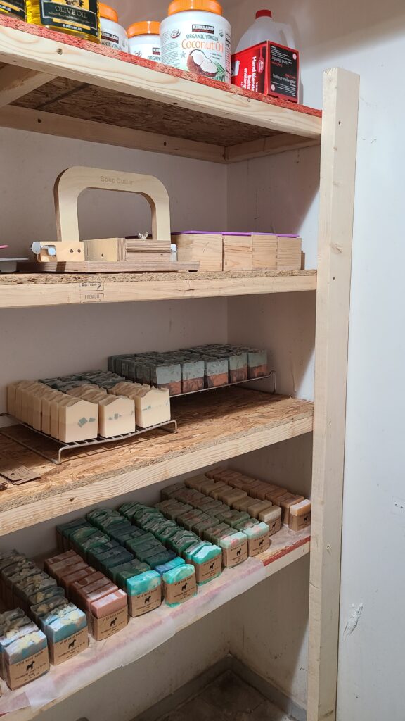 Soap storage area, see the wire-type soap cutter, and other soap making supplies