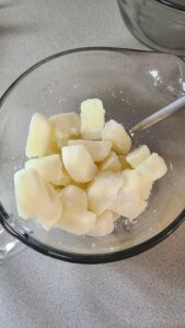 Glass bowl used for mixing frozen goat's milk and lye
