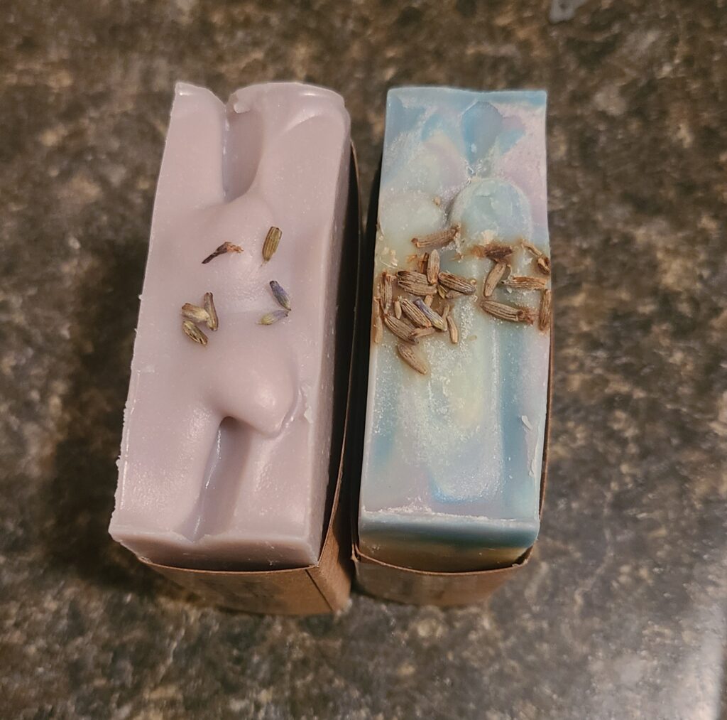 Lavender soap with dried flowers added after curing and before curing as soap making mistakes