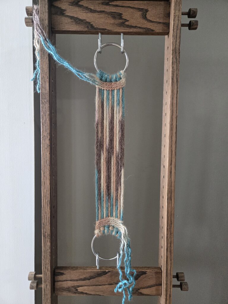 Whip stitch completed on the breast collar.