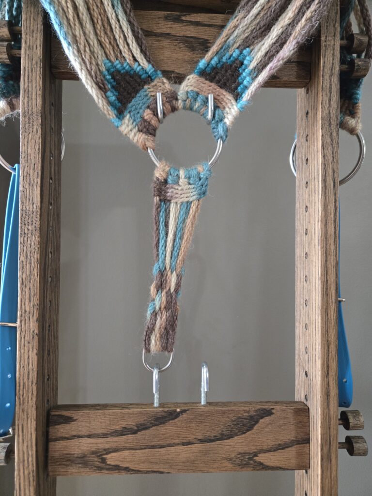 Completed center piece that goes between the horse's legs.