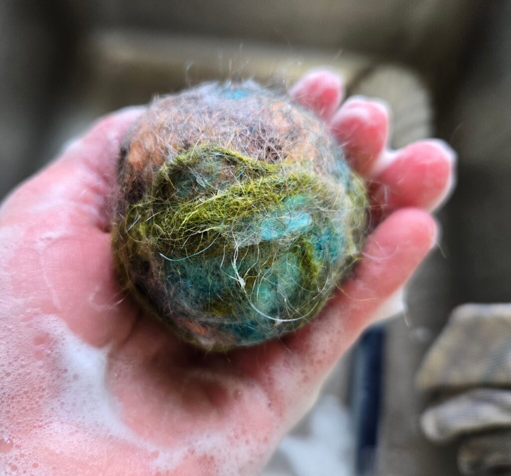 Soap on a felted dryer ball