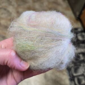 Fiber wrapped around a wet bar of soap,