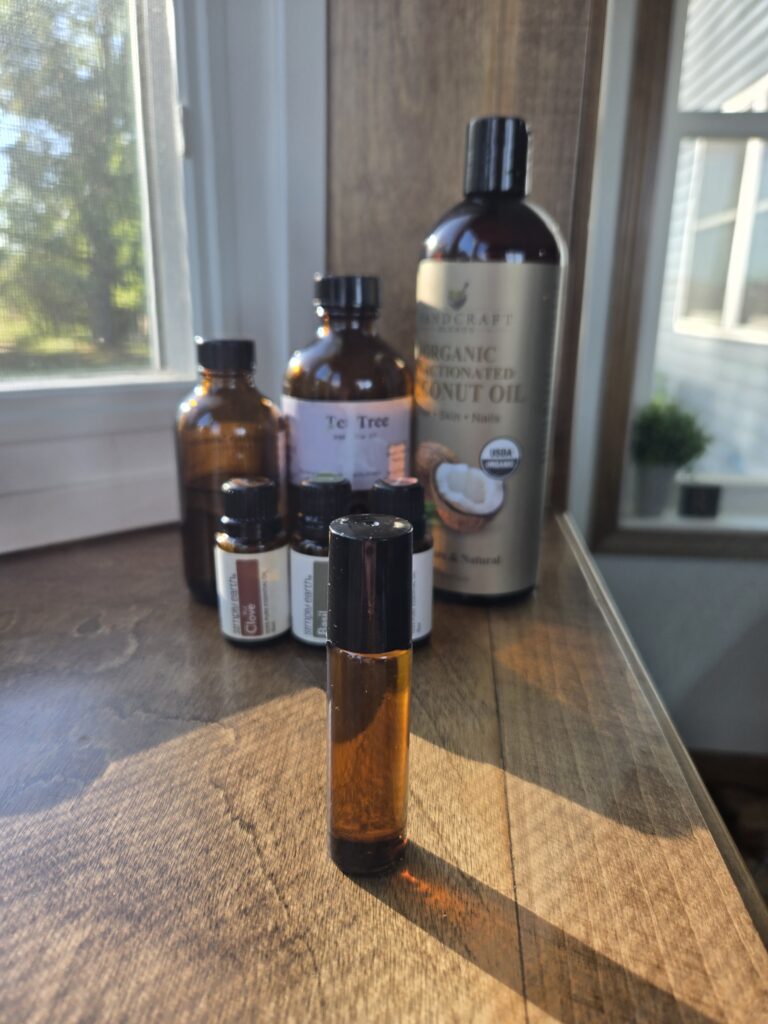 Bottles of essential oils and a roller bottle.