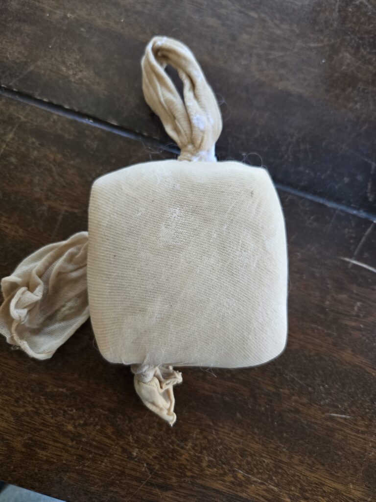 Felted soap inside a nylon stocking.