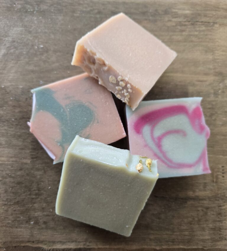 four bars of goat milk soap