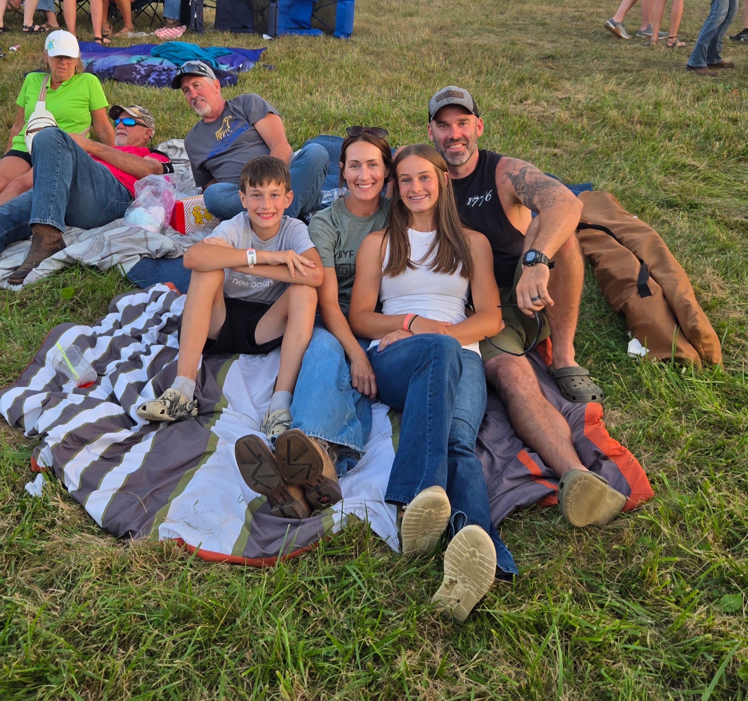 Family sitting on a blanket