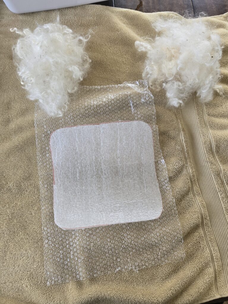 Materials ready for wet felting