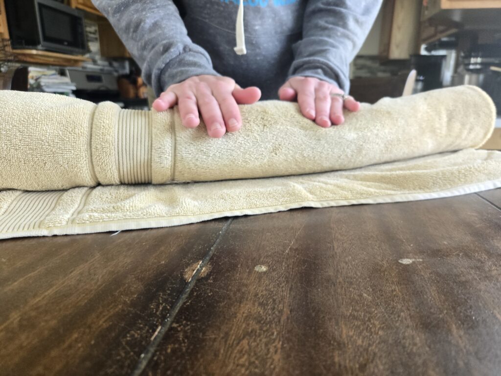 Rolling the wet felt