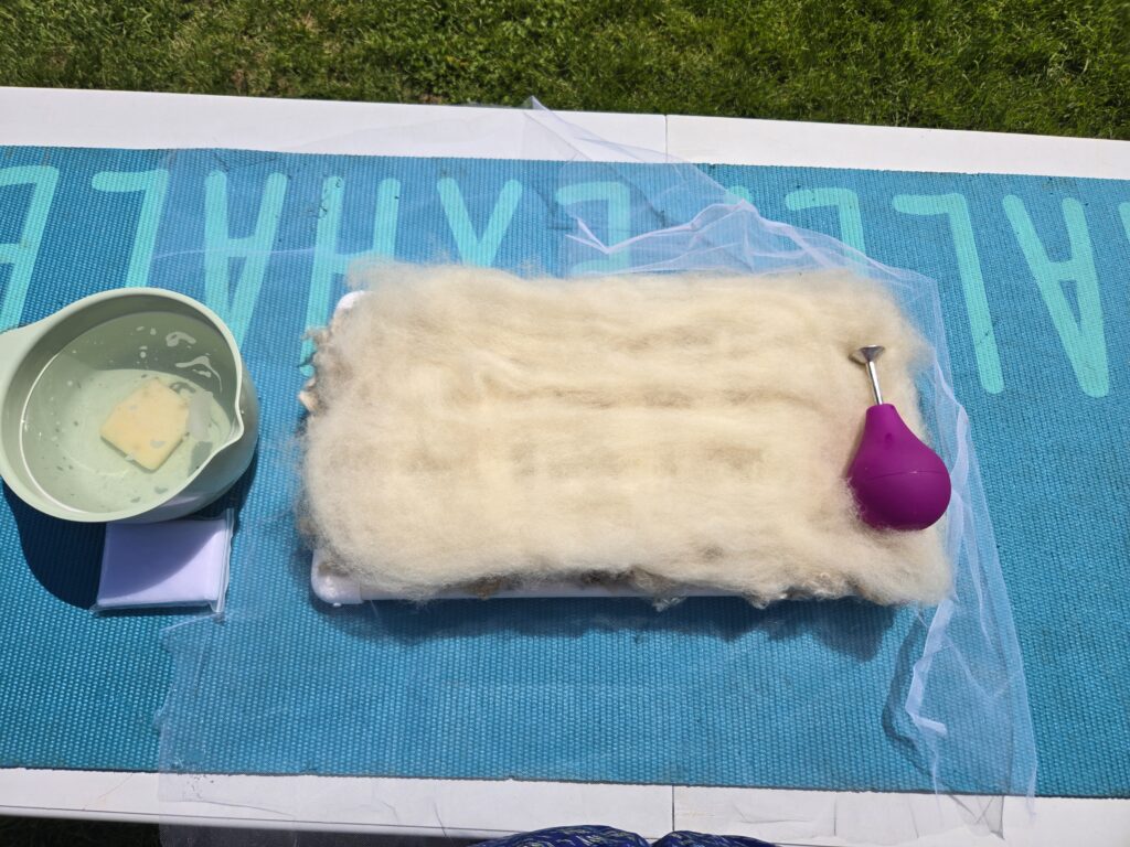 Materials ready for making a felted fleece rug