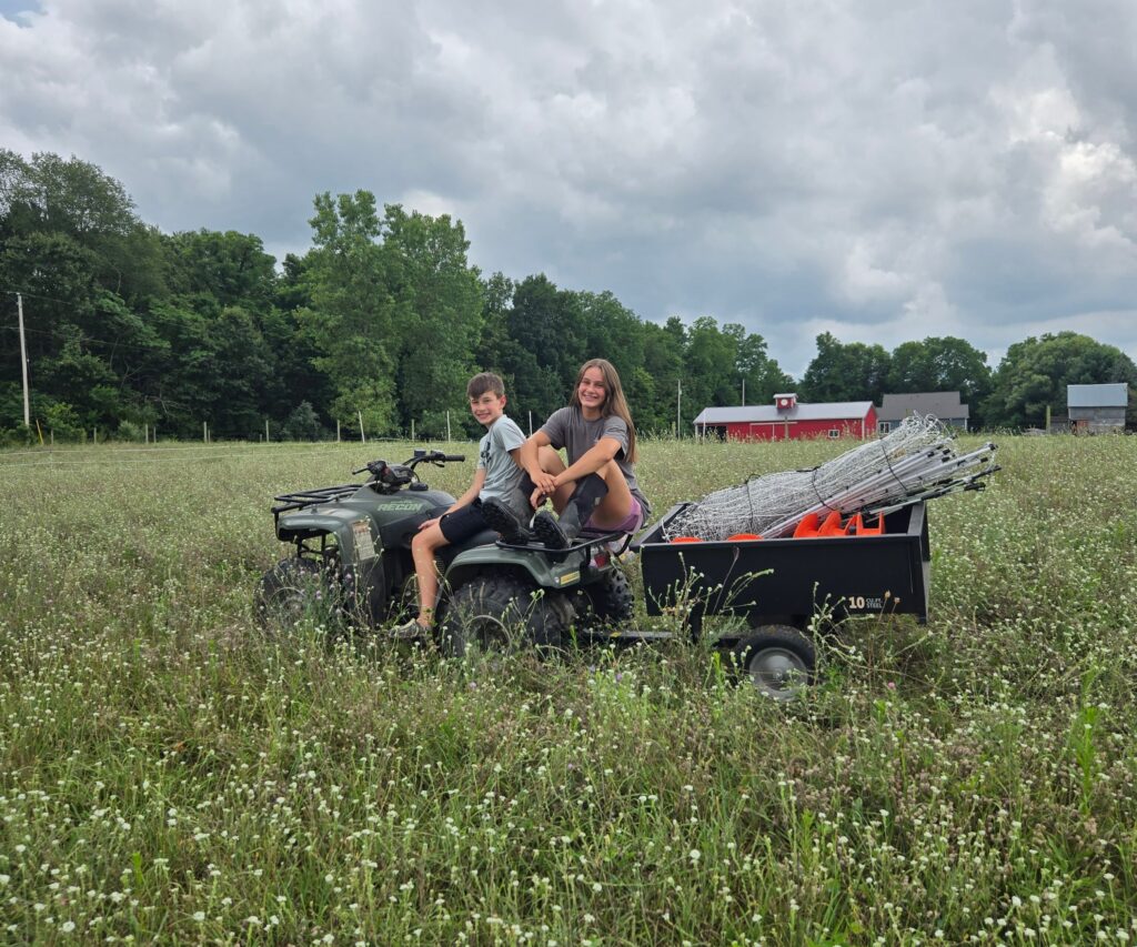 Rotational grazing supplies in a trailer pulled by an ATV