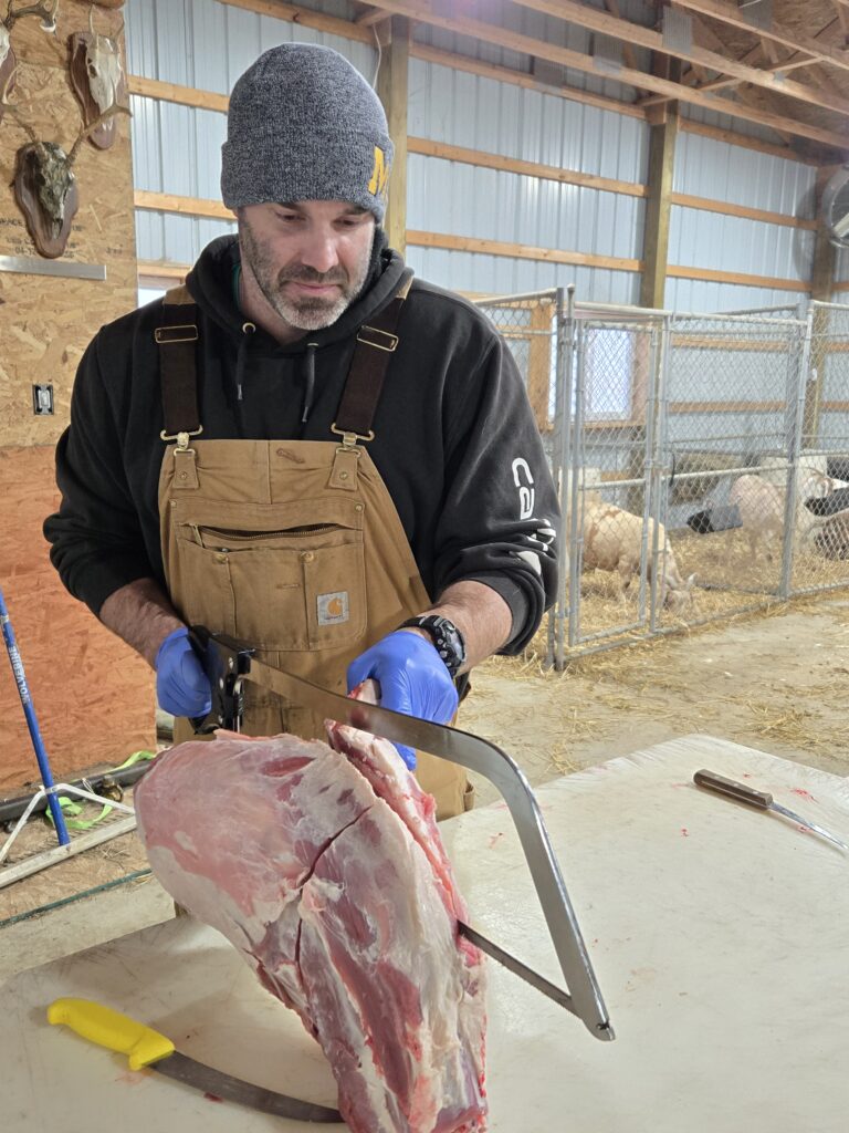 Using a cut sheet to process a goat.