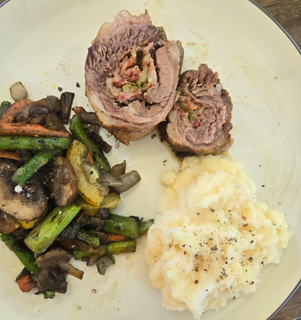 Goat belly rouladen plated.