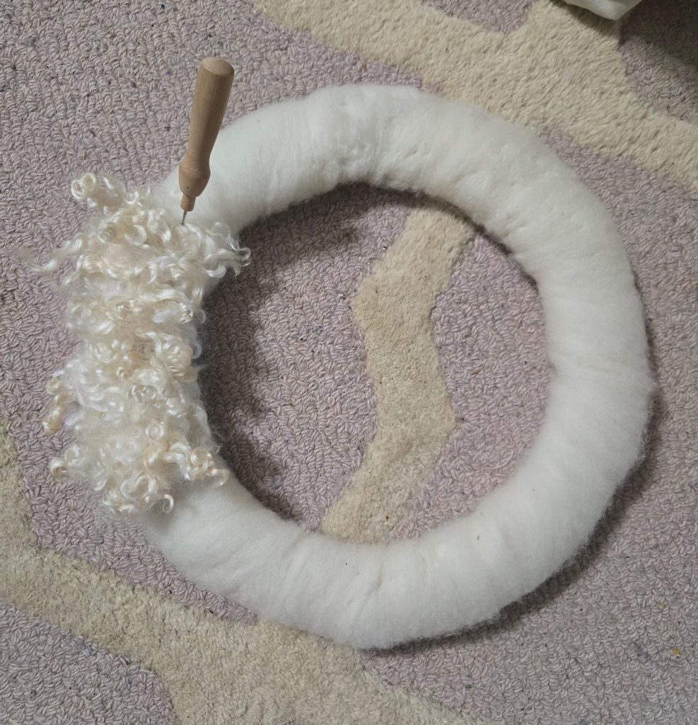 Mohair lock wreath in progress