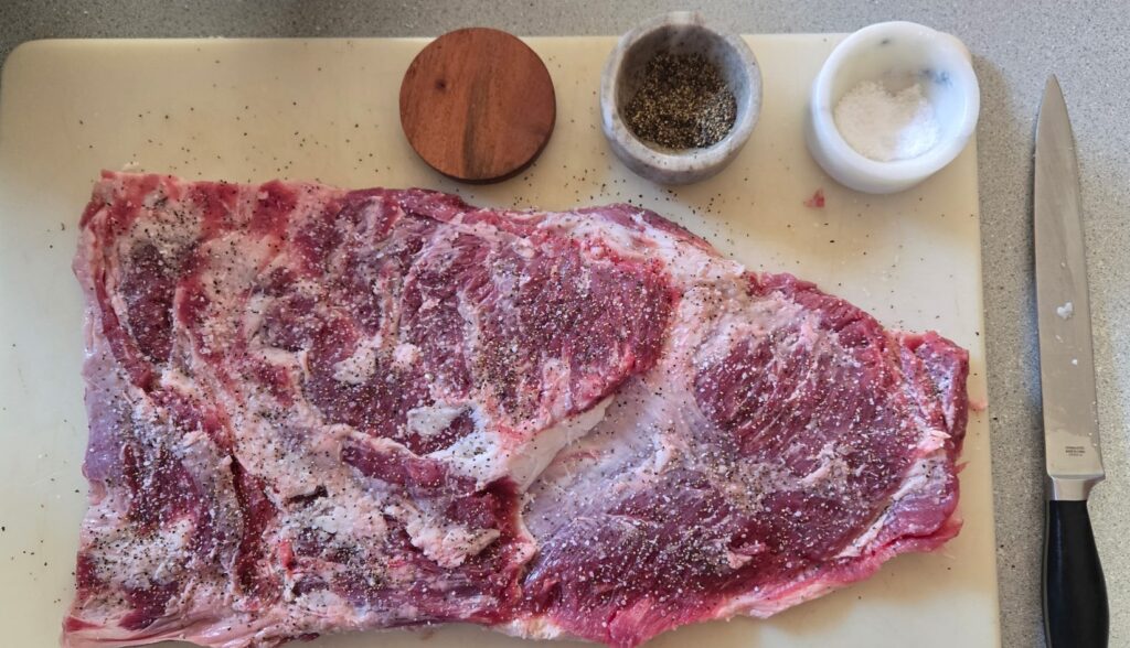 Goat belly with salt and pepper.