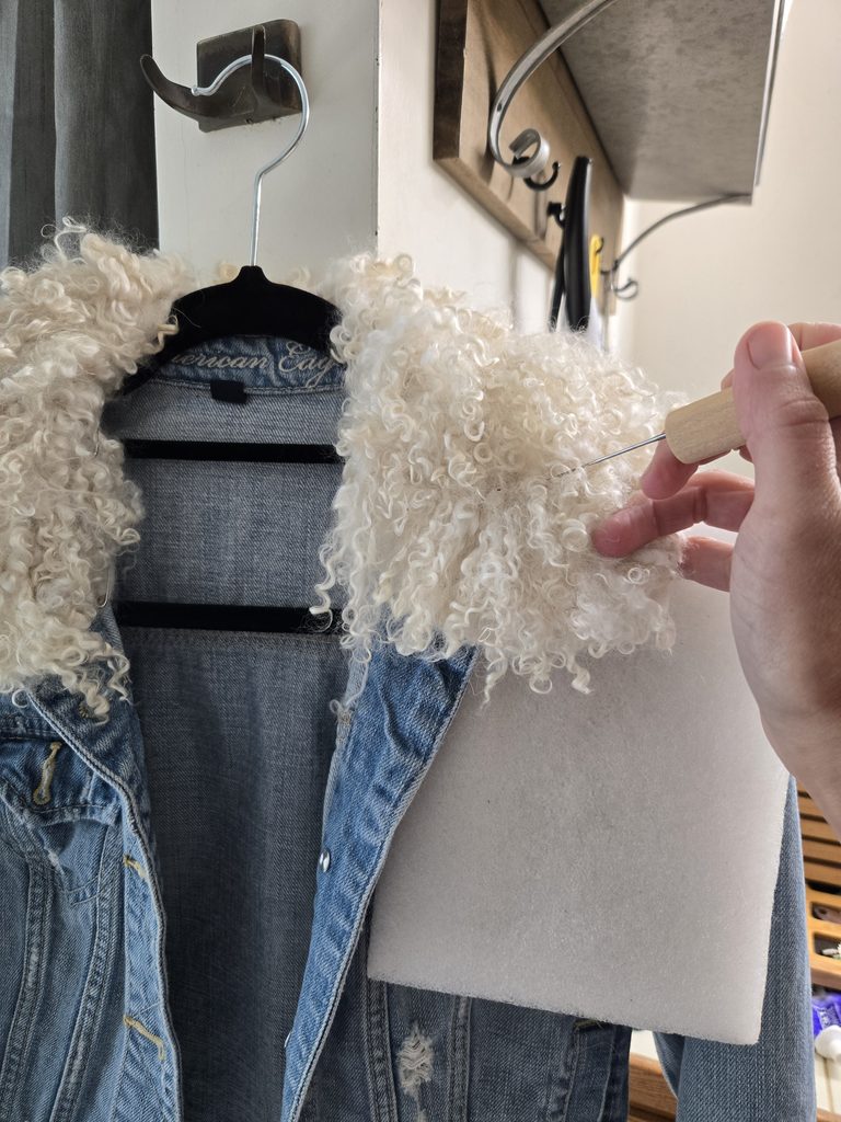 Needle felting the collar.